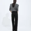 Jean noir délavé à jambes larges