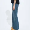 Jean évasé en denim délavé indigo moyen