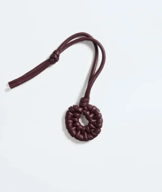 Pendentif nœud en forme de coquillage