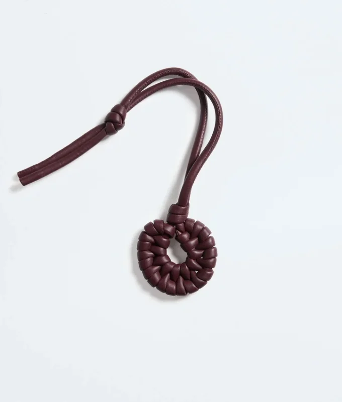 Pendentif nœud en forme de coquillage