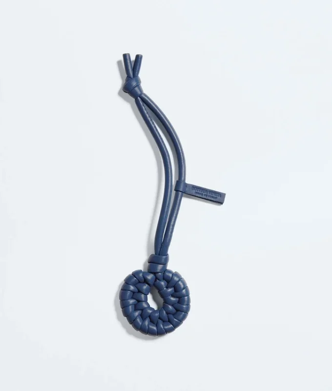 Pendentif nœud en forme de coquillage