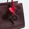 Pendentif nœud en forme de coquillage
