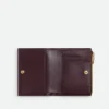 Petit portefeuille à deux volets en cuir Intrecciato Petit portefeuille à deux volets en cuir Intrecciato
