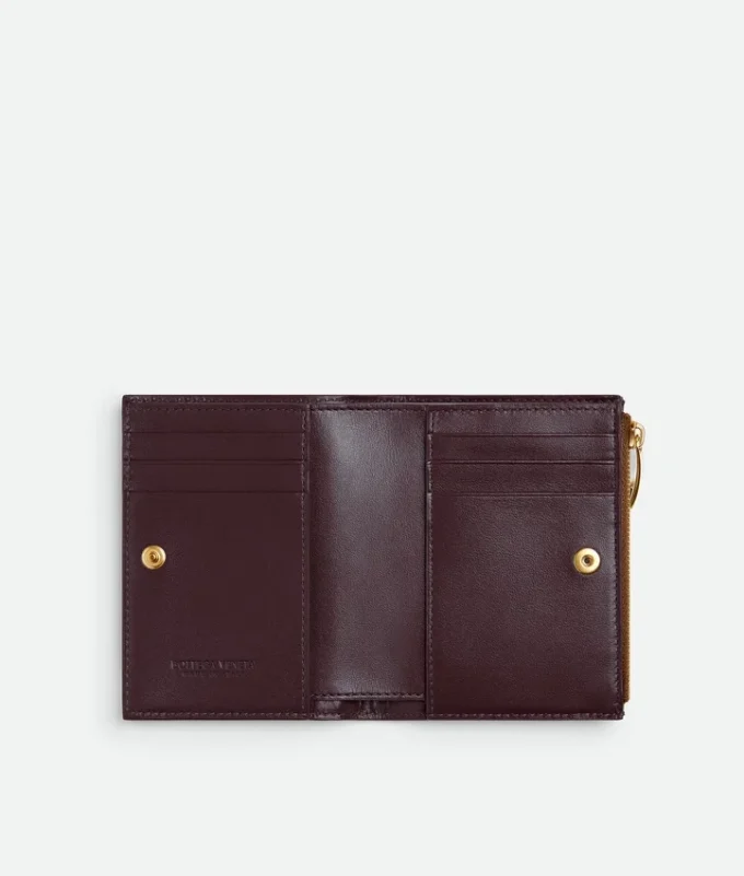 Petit portefeuille à deux volets en cuir Intrecciato Petit portefeuille à deux volets en cuir Intrecciato