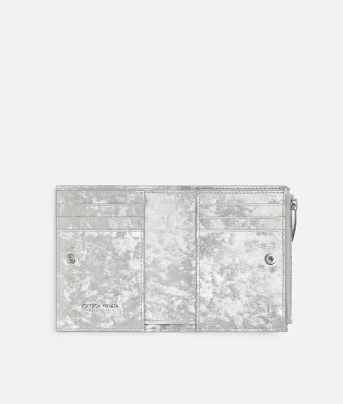 Petit portefeuille à deux volets en cuir Intrecciato Petit portefeuille à deux volets en cuir Intrecciato