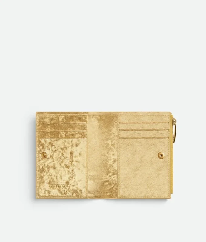 Petit portefeuille à deux volets en cuir Intrecciato Petit portefeuille à deux volets en cuir Intrecciato