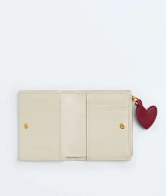 Petit portefeuille à deux volets en cuir Intrecciato