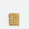 Petit portefeuille à deux volets en cuir Intrecciato Petit portefeuille à deux volets en cuir Intrecciato