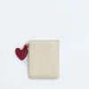 Petit portefeuille à deux volets en cuir Intrecciato