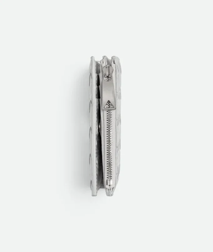 Petit portefeuille à deux volets en cuir Intrecciato Petit portefeuille à deux volets en cuir Intrecciato