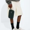 Petite pochette Intrecciato avec dragonne