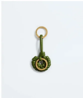 Porte-clés en forme de coquillage noué