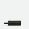 Trousse cylindrique en cuir Intrecciato