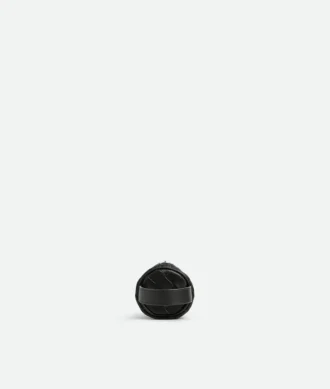 Trousse cylindrique en cuir Intrecciato